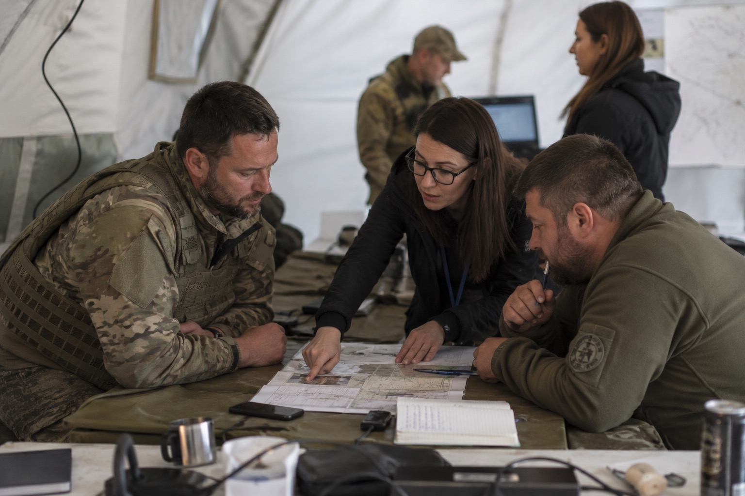 Word Bridge Logistics interpreter supporting a client briefing in the field